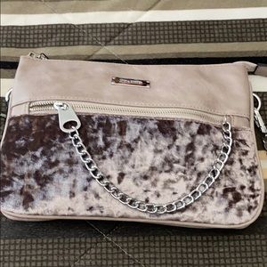 An adorable Coco+Carmen crushed pink velvet purse